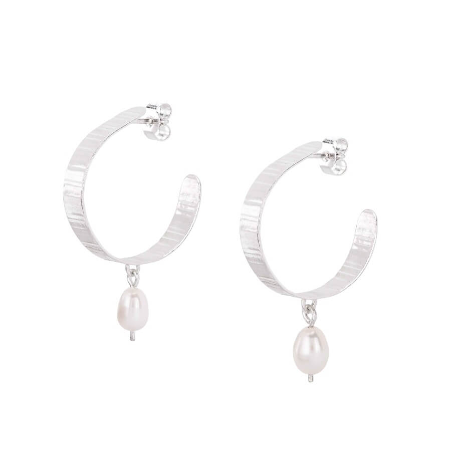 Inverse Pearl Hoops by Olivia Taylor, a pair of silver earrings with pearl droplet. | Contemporary, sustainable jewellery for sale at The Biscuit Factory Newcastle