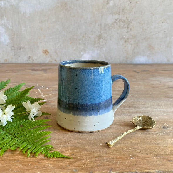 Sea Foam Tall Mug by Emily Doran, a handmade ceramic mug with a blue speckled glaze | Unique homewares for sale at The Biscuit Factory Newcastle