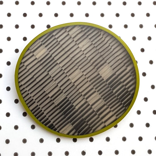 Changing Stripes Brooch by Kaz Robertson, a green brooch with grey and black srtripes | Unique handmade jewellery for sale at The Biscuit Factory Newcastle