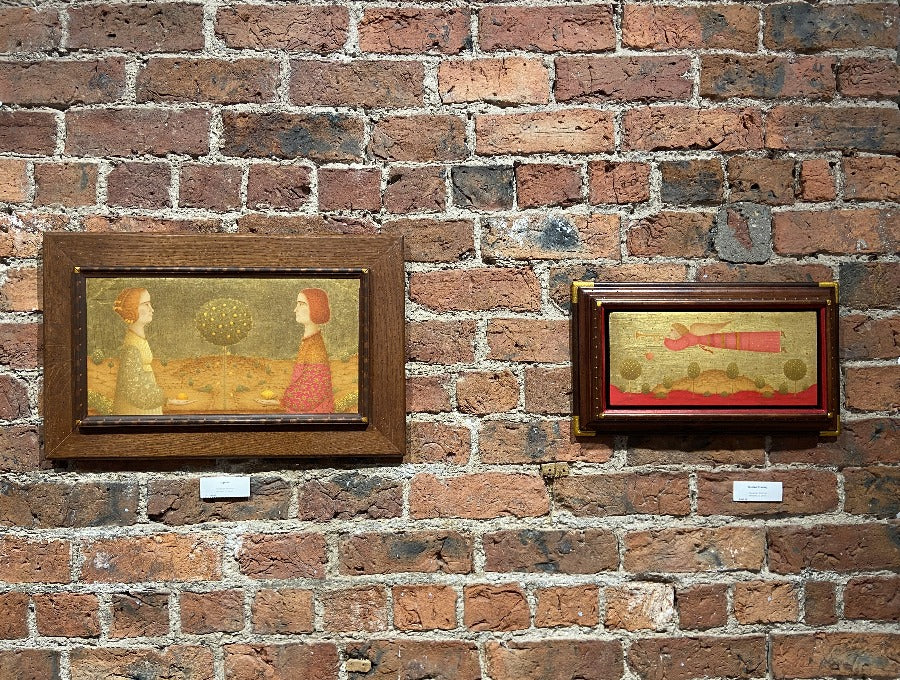 Original painting by Alexander Shibniov hanging on a brick wall in The Biscuit Factory art gallery.