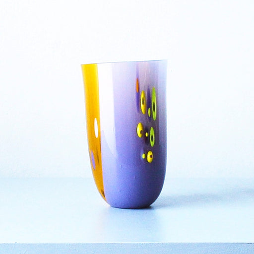 'Bluestar Lotus Textured Drop Out Vessel - Medium' by Catherine Mahe, a yellow and purple glass vase.