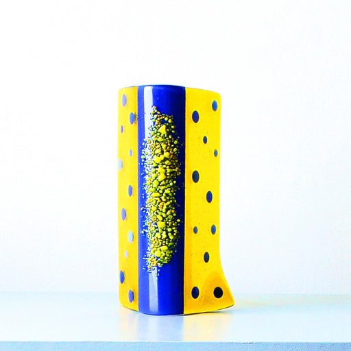 'Forget-Me-Not Textured Sculpture' by Catherine Mahe, a kilnformed curved glass sculpture in blue and yellow
