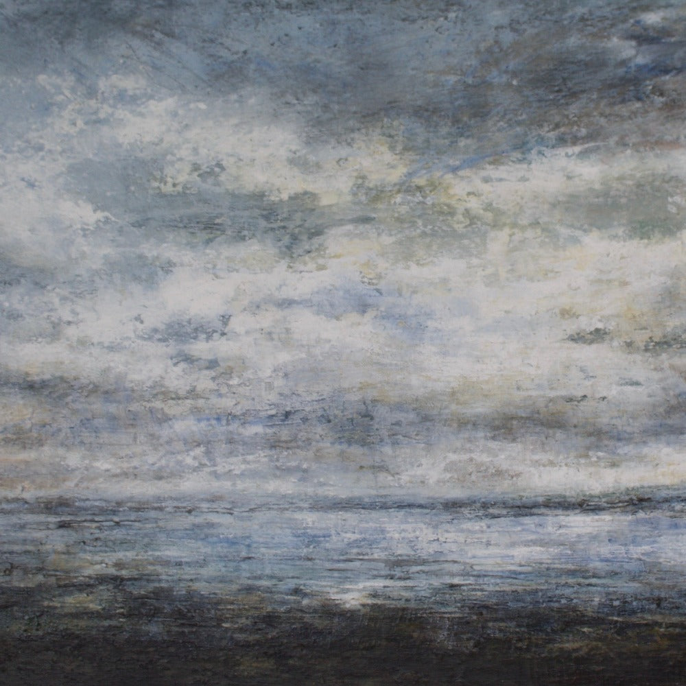 Buy 'Lindisfarne Causeway at low tide Northumberland', an atmospheric landscape by Sue Lawson. Image shows a painting of a coastal scene in stormy blues and greys with pale yellow highlights. 