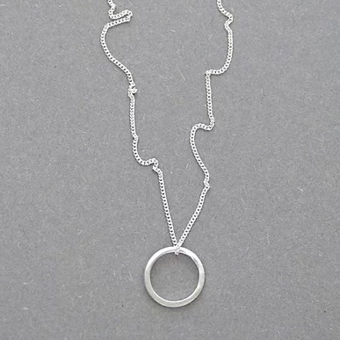 Small Circle silver necklace by Elin Horgan for sale at The Biscuit Factory. Image shows a silver necklace made of a silver hoop on a chain.