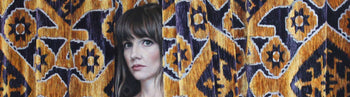 Image shows a cropped section of a photo-realistic portrait painting by Laura Quinn Harris