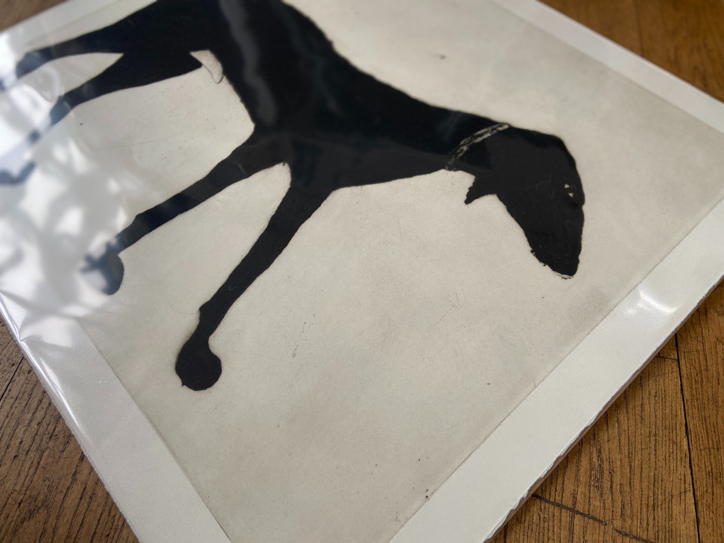 'Black Dog' by Kate Boxer, an original print ofa black dog. Limited edition art prints for sale at The Biscuit Factory Newcastle.