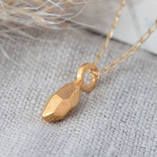 Asteroid Necklace Gold by Elin Horgan, a gold pendant on a gold chain. | Contemporary jewellery for sale at The Biscuit Factory Newcastle