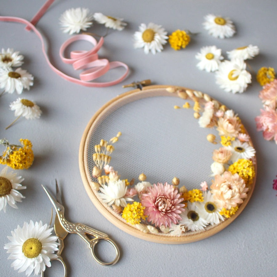 An embroidery of dried flowers on tulle, made at an embroidery workshop with Olga Prinku at The Biscuit Factory Newcastle.