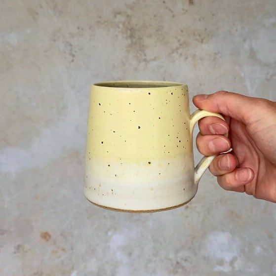 Golden Sand Tall Mug by Emily Doran, a handmade ceramic mug with a yellow speckled glaze | Unique homewares for sale at The Biscuit Factory Newcastle