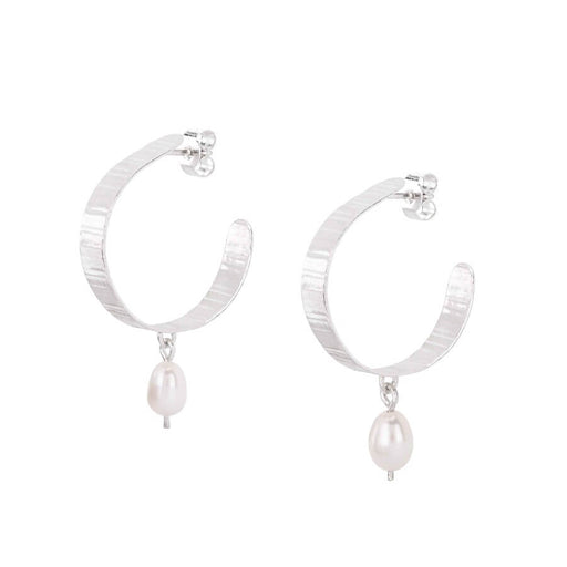 Inverse Pearl Hoops by Olivia Taylor, a pair of silver earrings with pearl droplet. | Contemporary, sustainable jewellery for sale at The Biscuit Factory Newcastle