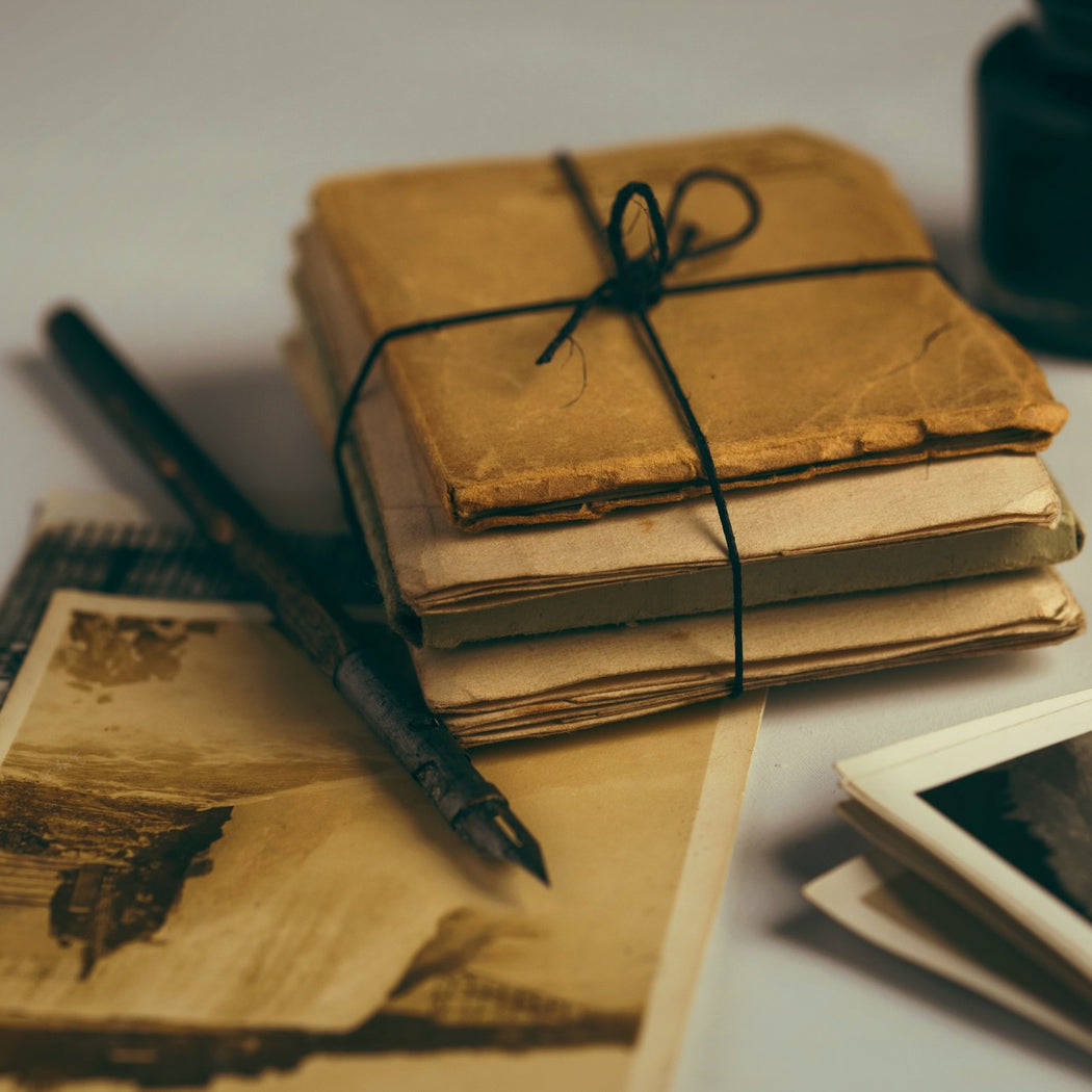 Rewriting the Past with Amanda Quinn, Creative Writing workshop at The Biscuit Factory Newcastle. Image of old papers and photographs by Joanna Kosinska via unsplash