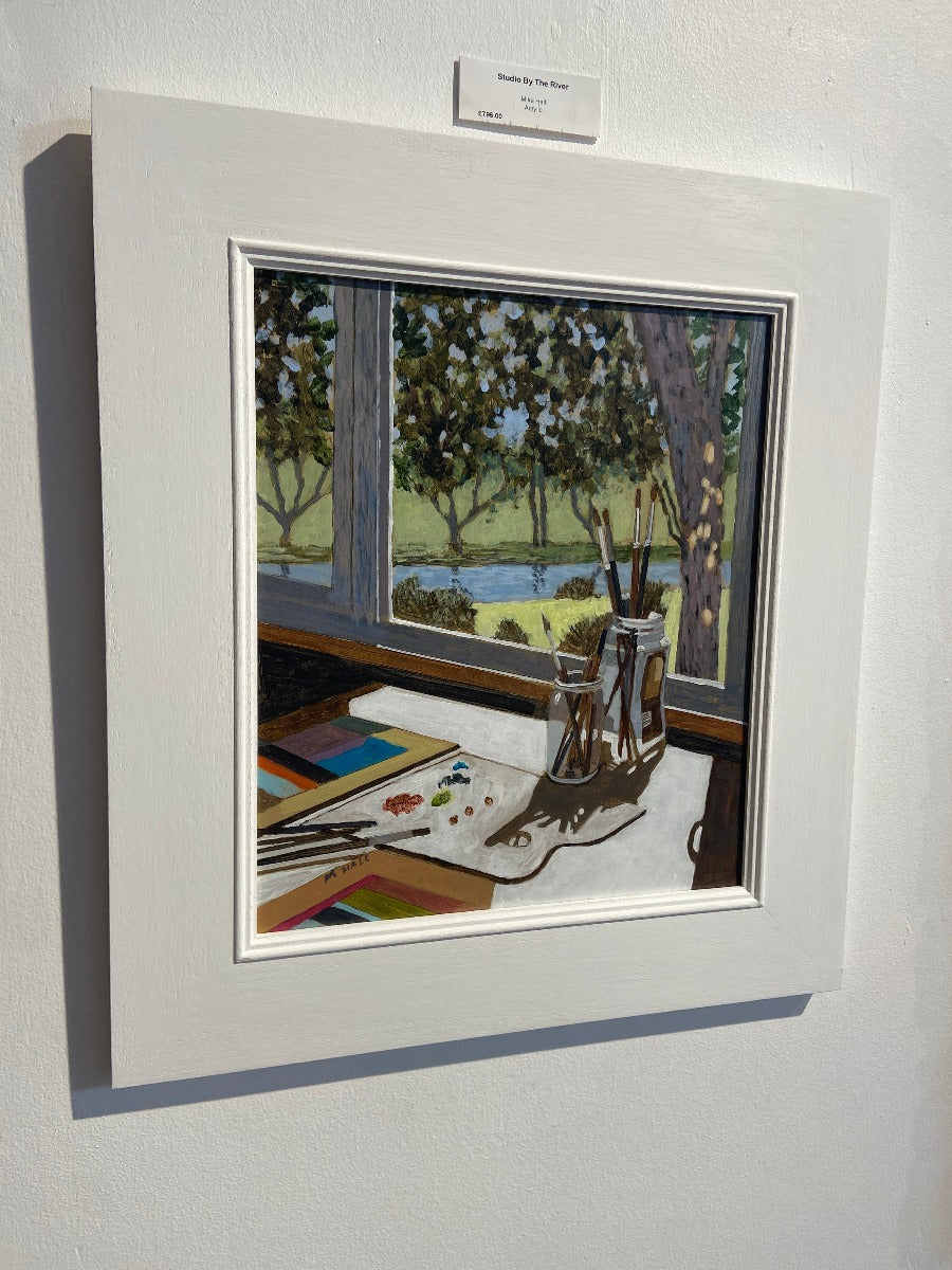 Studio by The River by Mike Hall, original painting of an interior scene overlooking a river. | Original art for sale a The Biscuit Factory Newcastle.