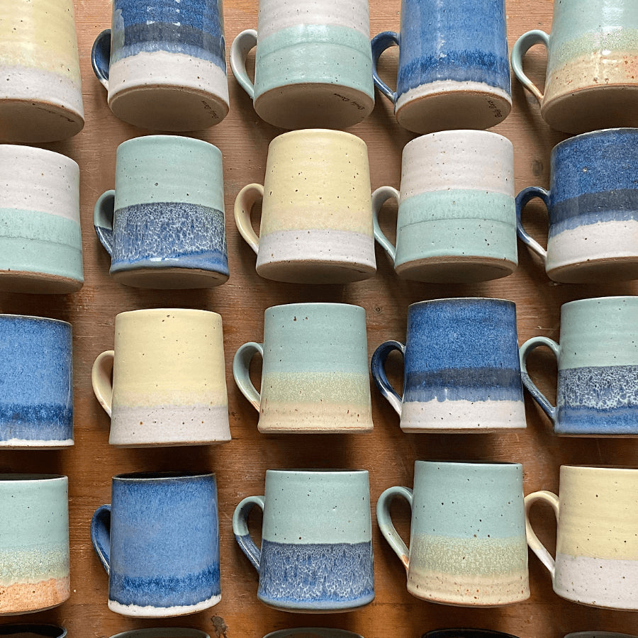Tall Mugs by Emily Doran, a selection of ceramic mugs in yellow, blue and green glazes. | Unique handmade homewares for sale at The Biscuit Factory Newcastle