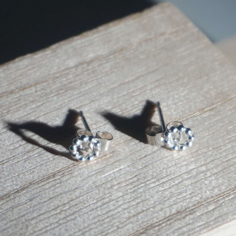 Dotty Tiny Circle Studs by Claire Lowe | Contemporary Jewellery for sale at The Biscuit Factory 