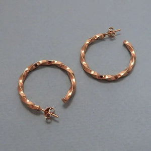 You added <b><u>Midi Twisted Hoop Earrings - Gold</u></b> to your cart.