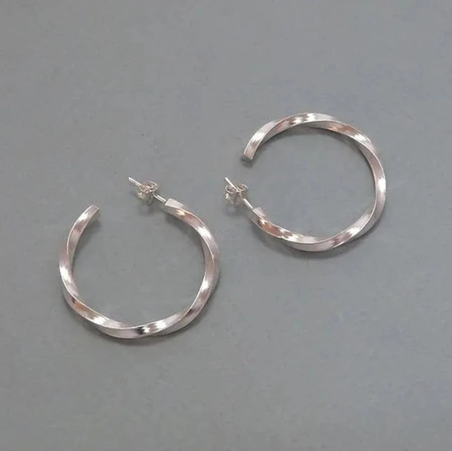 Midi Twisted Hoop Earrings in Silver by Elin Horgan | Contemporary Jewellery for sale at The Biscuit Factory 