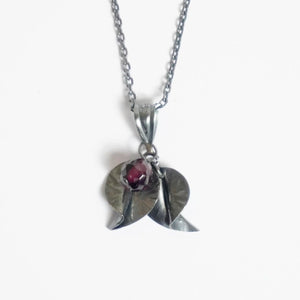 You added <b><u>Tiny Leaves Pendant | Oxidised & Garnet</u></b> to your cart.