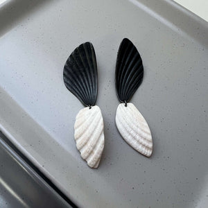 You added <b><u>Shadow Imprint Earrings with Shell</u></b> to your cart.
