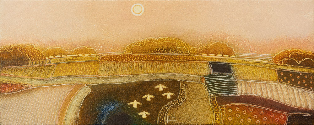 'That Soft Pink', an original painting by Dutch artist Rob Van Hoek at The Biscuit Factory. Image shows an oil painting of an abstract golden landscape in the counrtyside with patterned fields, a white orb near the top centre with a white ring around it and white silhouetted birds at the bottom centre. 