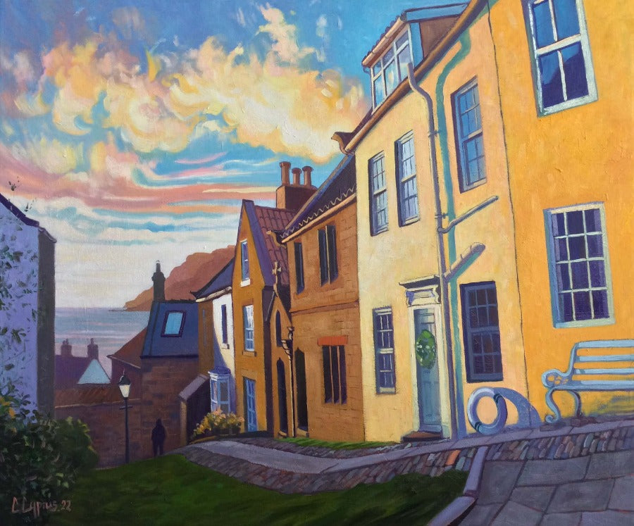 At First Light by Chris Cyprus, an original oil panting of a sun-lit terrace of houses by the sea. I Original art for sale at The Biscuit Factory Newcastle