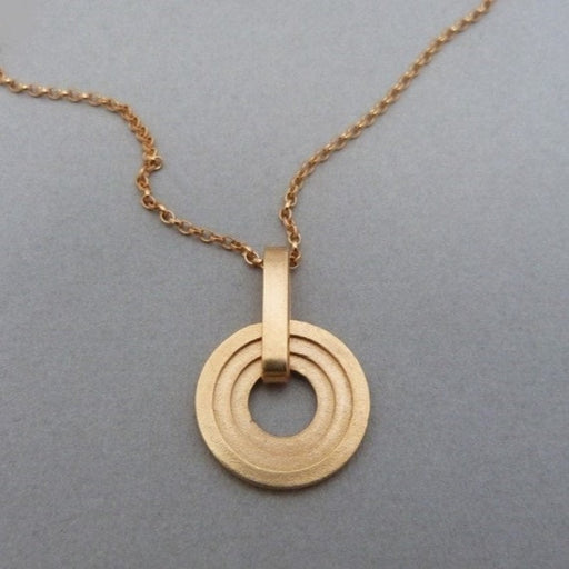 Athena Circle Pendant Gold by Elin Horgan | Minimalist Jewellery by Elin Horgan for sale at The Biscuit Factory 