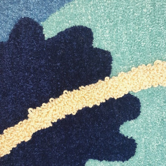 Blue Berry by Loop & Yarn, a handmade textile rug in shades of blue with a cream stripe. | Original, handmade textile art for sale at The Biscuit Factory Newcastle.