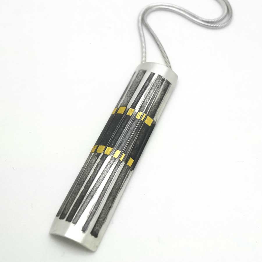 Buy 'Rhythm Stick Pendant' handmade jewellery by Jessica Briggs at The Biscuit Factory.