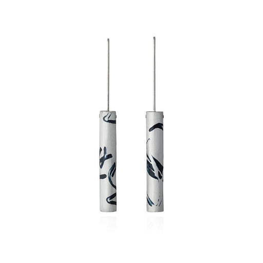 Enamel Inlay Drops by Lyndsay Fairley, a pair of silver tubular earrings with black, abstract enamel details. | Find original, handmade jewellery for sale at The Biscuit Factory Newcastle