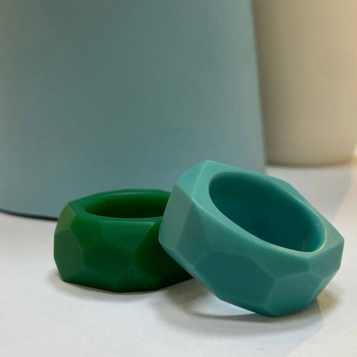 Geo Rings by Karen McMillan. A green and a turquiose faceted resin ring. | Colourful jewellery for sale at The Biscuit Factory Newcastle