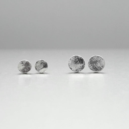 Granule Earstuds by Emily Collins. A pair of silver ear studs. | Contemporary minimalist jewellery for sale at The Biscuit Factory Newcastle