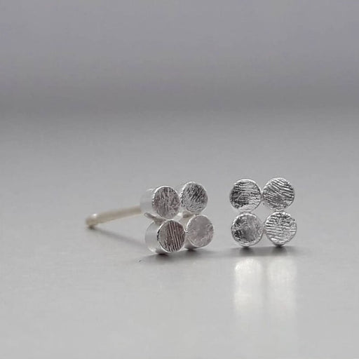 Quartet Earstuds by Emily Collins, earrings of four silver discs. | Contemporary minilmalist jewellery for sale at The Biscuit Factory Newcastle