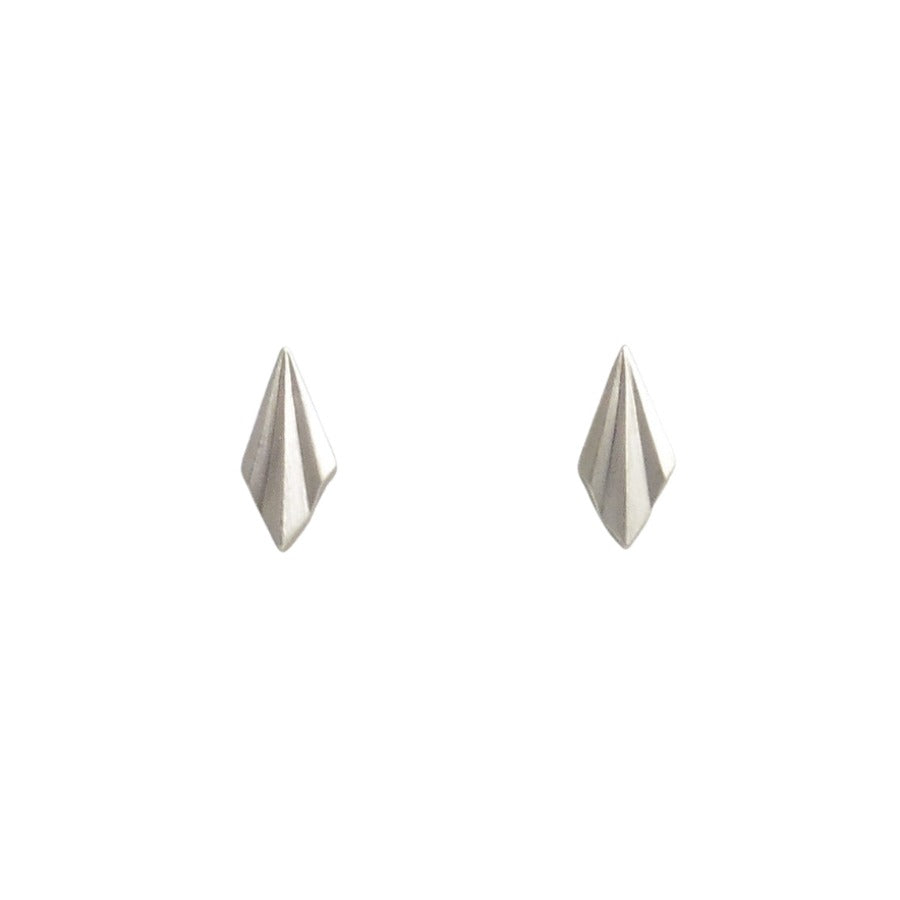 Pleated Tiny Studs by Alice Barnes at The Biscuit Factory. Image shows a pair of silver earrings in the shape of a triangle with a pleat in the centre.