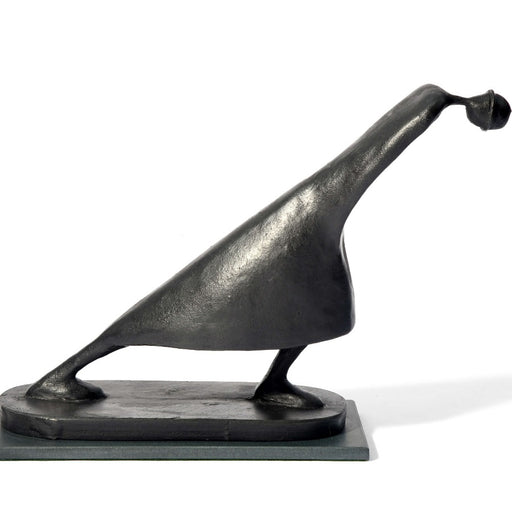 The Journey by Jennifer Watt, a slate resin sculpture of a figure leaning forward | Original, contemporary sculpture for sale at The Biscuit Factory Newcastle.