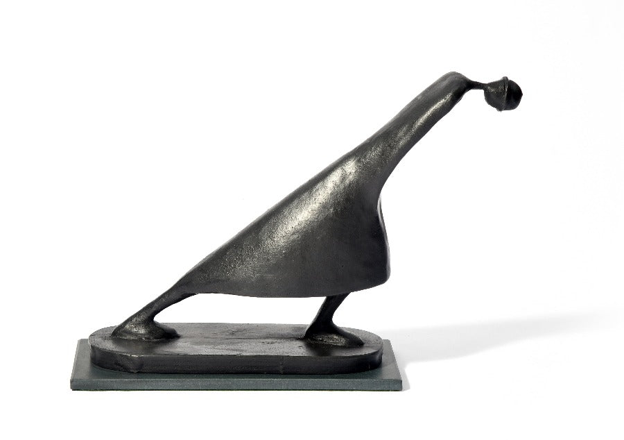 The Journey by Jennifer Watt, a slate resin sculpture of a figure leaning forward | Original, contemporary sculpture for sale at The Biscuit Factory Newcastle.