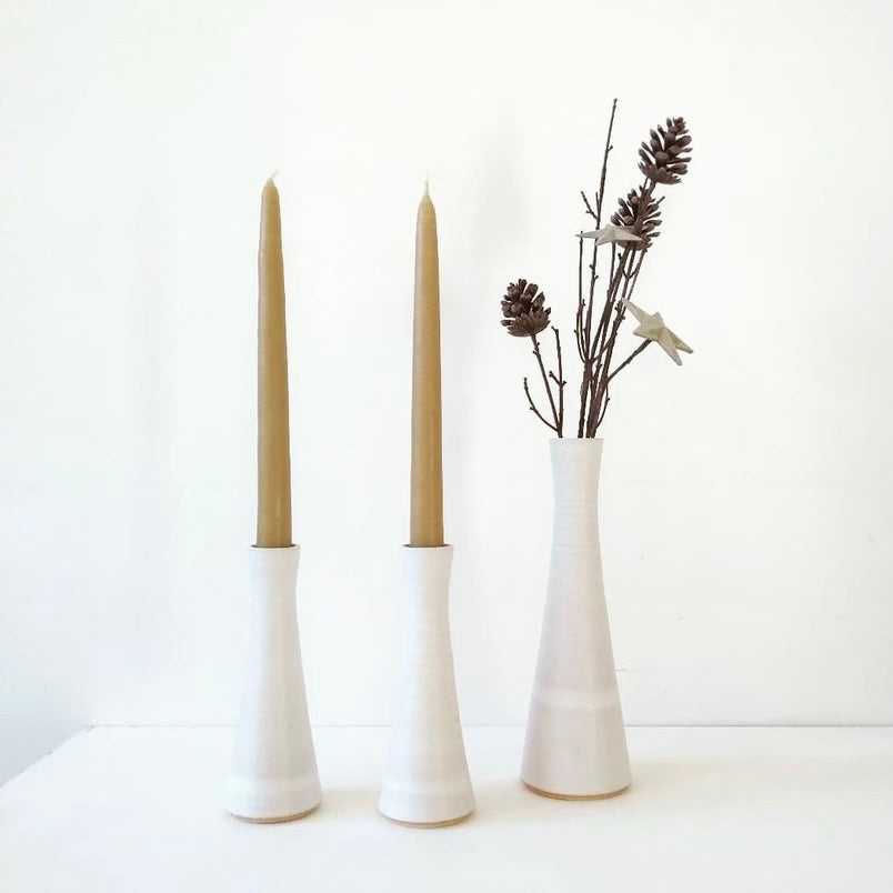 Buy 'White Candlestick' by Tone Von Krogh online at The Biscuit Factory. Image shows three white candlesticks in three different sizes, small, medium and large.