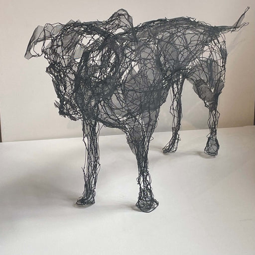 Wire dog sculpture workshop by artist Zoe Robinson at The Biscuit Factory Newcastle, a black wire dog sculpture. | Creative workshops and art classes at The Biscuit Factory Newcastle.